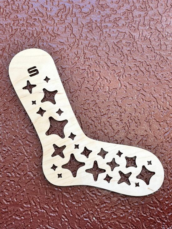 Zeķes formētājs "s"